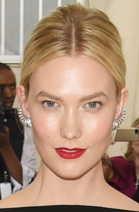 Who made Karlie Kloss' makeup including red lipstick, nude nail polish